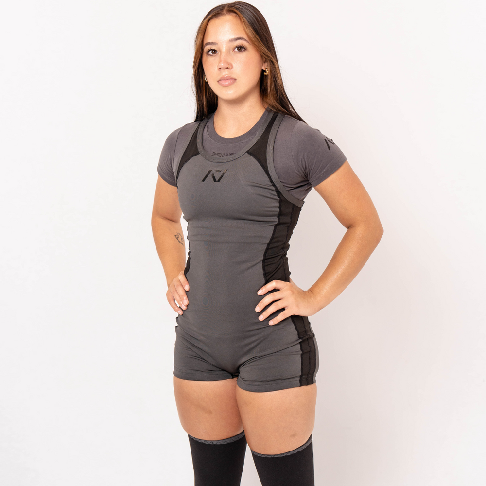 
                      
                        A7 IPF Approved Shadow Stone Grey Luno singlet features extra lat mobility, side panel stitching to guide the squat depth level and curved panel design for a slimming look. The Women's singlet features a tapered waist and additional quad room. The IPF Approved Kit includes Luno Powerlifting Singlet, A7 Meet Shirt, A7 Zebra Wrist Wraps, A7 Deadlift Socks, Hourglass Knee Sleeves (Stiff and Rigor Mortis Knee Sleeves). Genouill�res powerlifting shipping to France, Spain, Ireland, Germany, Italy, Sweden and EU.
                      
                    