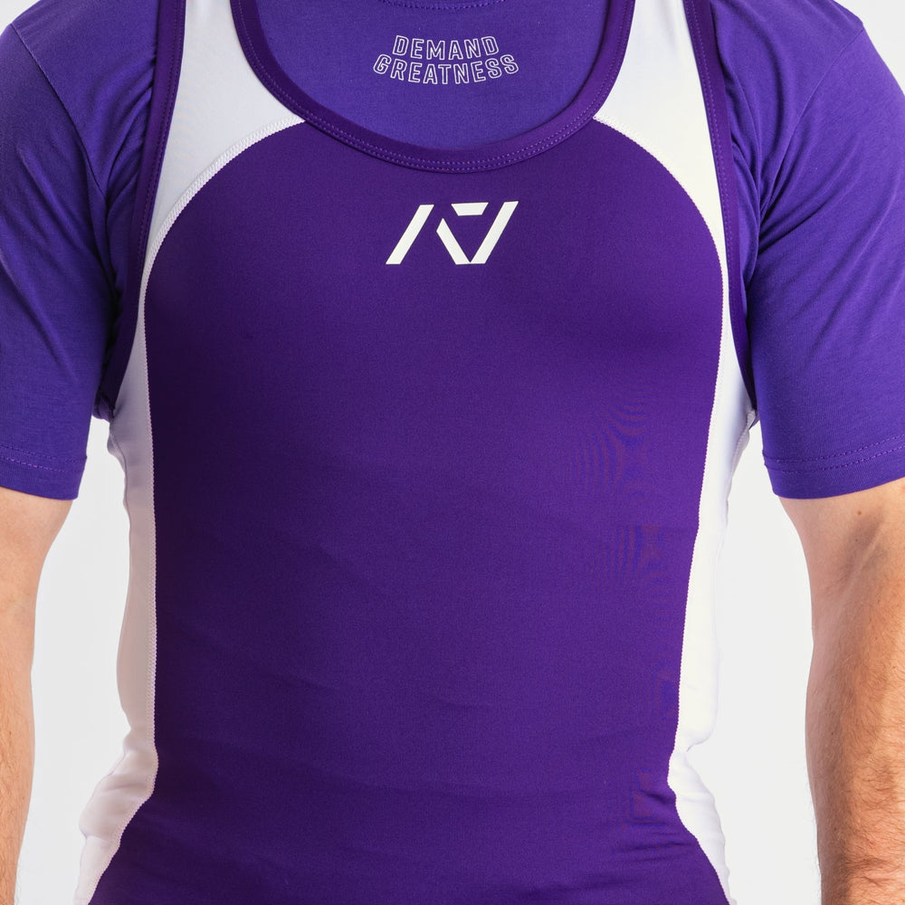 
                      
                        A7 IPF Approved Purple Luno singlet features extra lat mobility, side panel stitching to guide the squat depth level and curved panel design for a slimming look. The Women's cut singlet features a tapered waist and additional quad room. The IPF Approved Kit includes Luno Powerlifting Singlet, A7 Meet Shirt, A7 Zebra Wrist Wraps, A7 Deadlift Socks, Hourglass Knee Sleeves. Genouill�res powerlifting shipping to France, Spain, Ireland, Germany, Italy, Sweden and EU.
                      
                    