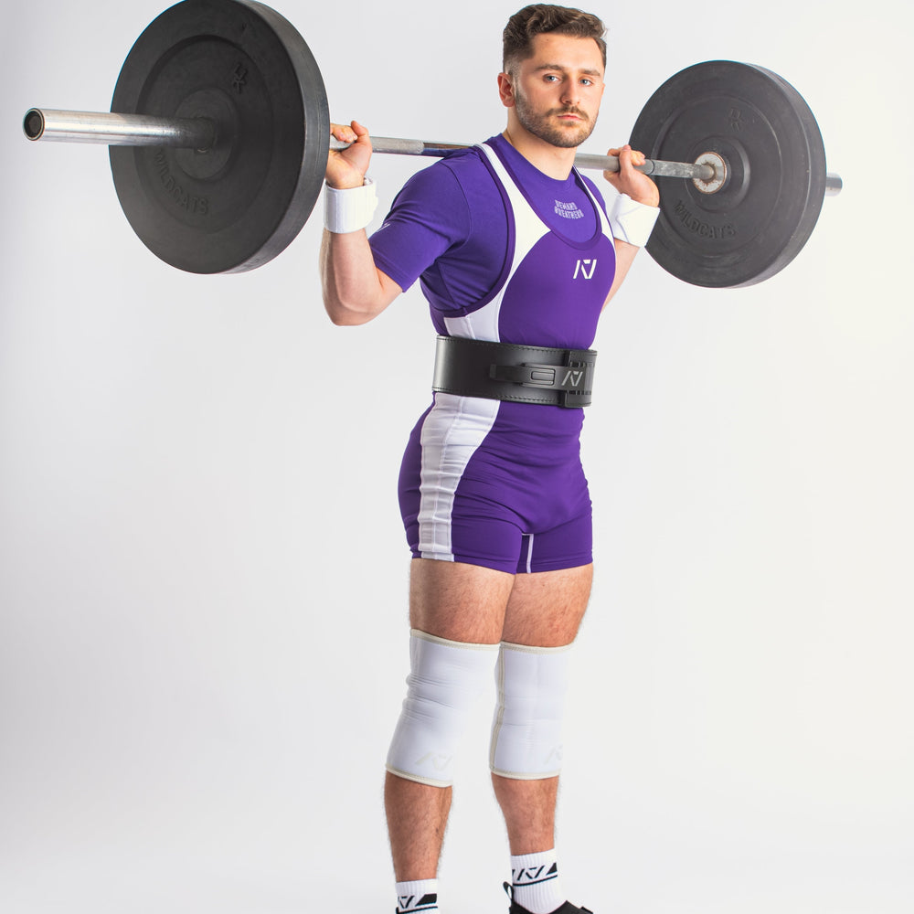 
                      
                        A7 IPF Approved Purple Luno singlet features extra lat mobility, side panel stitching to guide the squat depth level and curved panel design for a slimming look. The Women's cut singlet features a tapered waist and additional quad room. The IPF Approved Kit includes Luno Powerlifting Singlet, A7 Meet Shirt, A7 Zebra Wrist Wraps, A7 Deadlift Socks, Hourglass Knee Sleeves. Genouill�res powerlifting shipping to France, Spain, Ireland, Germany, Italy, Sweden and EU.
                      
                    