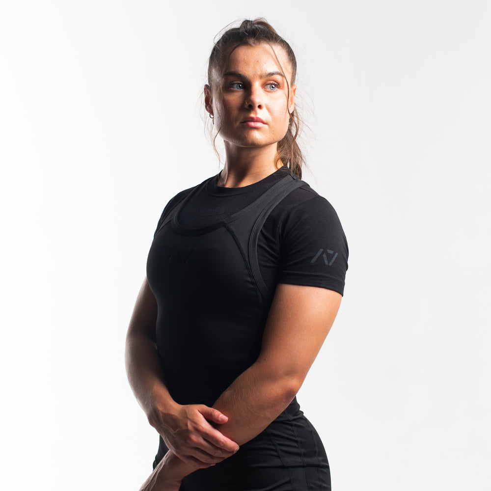 
                      
                        A7 IPF Approved Stealth Luno singlet with extra lat mobility, side panel stitching to guide the squat depth level and curved panel design for a slimming look. The Women's singlet features a tapered waist and additional quad room. The IPF Approved Kit includes Powerlifting Singlet, A7 Meet Shirt, A7 Zebra Wrist Wraps, A7 Deadlift Socks, Hourglass Knee Sleeves (Stiff Knee Sleeves and Rigor Mortis Knee Sleeves). Genouillères powerlifting shipping to France, Spain, Ireland, Germany, Italy, Sweden and EU.
                      
                    