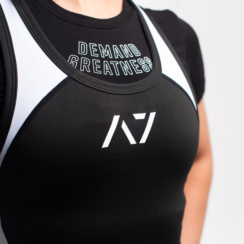 
                      
                        A7 IPF Approved Domino Luno singlet features extra lat mobility, side panel stitching to guide the squat depth level and curved panel design for a slimming look. The Women's cut singlet features a tapered waist and additional quad room. The IPF Approved Kit includes Powerlifting Singlet, A7 Meet Shirt, A7 Zebra Wrist Wraps, A7 Deadlift Socks, Hourglass Knee Sleeves (Stiff Knee Sleeves and Rigor Mortis Knee Sleeves). Genouillères powerlifting shipping to France, Spain, Ireland, Germany, Italy, Sweden and EU.
                      
                    