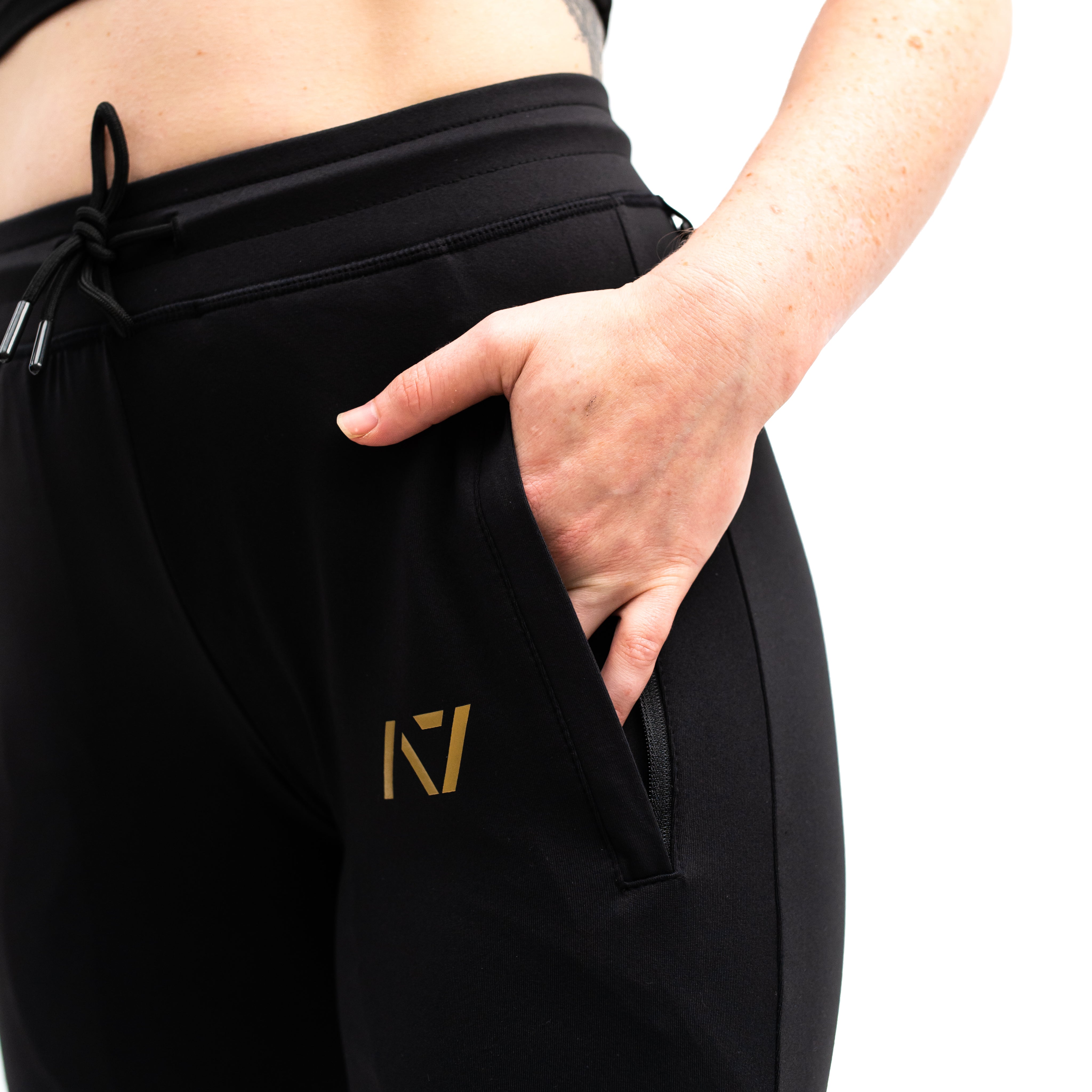 Gold joggers womens hot sale